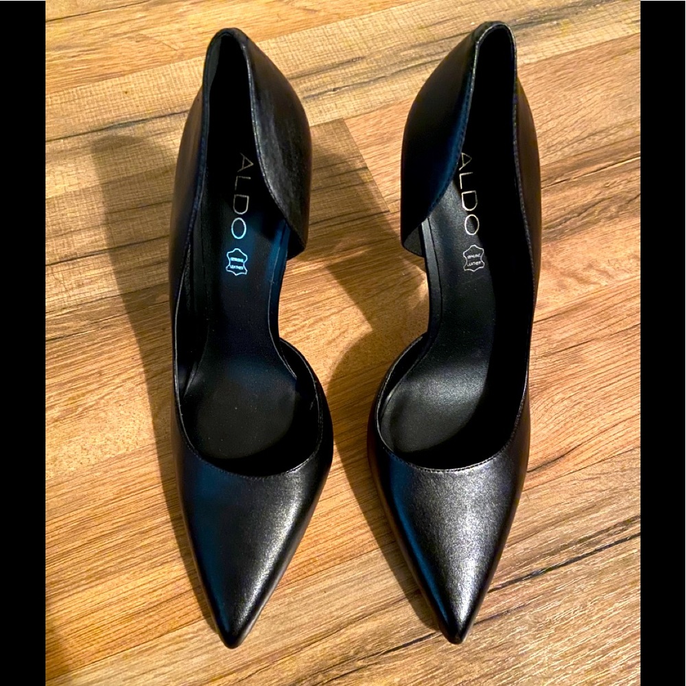 Black leather pumps